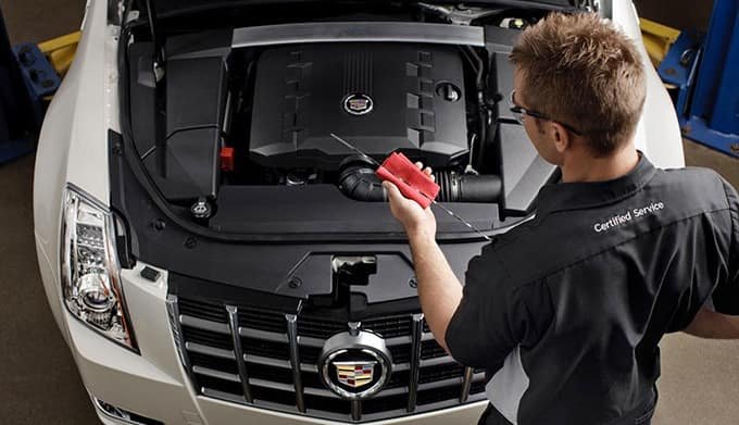 Cadillac Brake Pad Service - Oil Change Service - & Air Conditioner Recharge Service